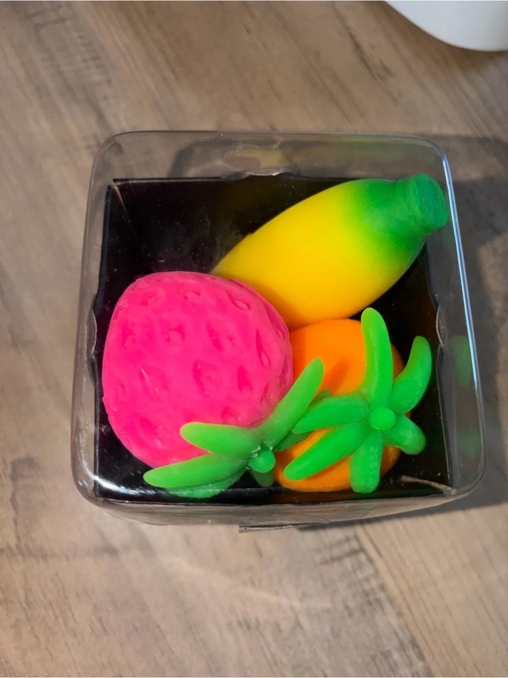 Schylling Groovy NeeDoh Fruit Stress Toy - Pink & Green